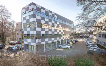 Modern exterior view of office building at Meerenakkerplein 11-20, Eindhoven De Hurk, showcasing office space rental opportunities.