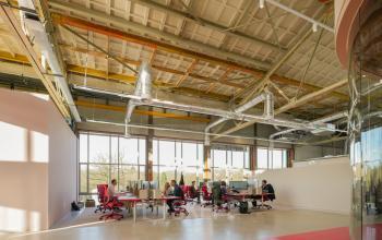 Spacious and open workspace with modern design at Frederiklaan 10A, Eindhoven's Strijp-S, featuring rent office space options in a vibrant, professional setting.