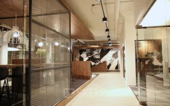 Stylish office space for rent at Frederiklaan 10E, Eindhoven Strijp-S, featuring modern interiors with sleek furnishings and a vibrant atmosphere, perfect for dynamic professionals.