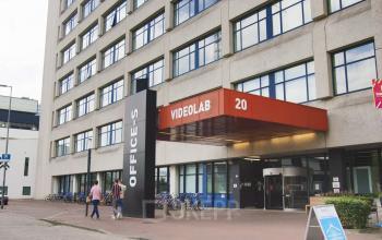 Exterior view of a building at Torenallee 20, Eindhoven Strijp-S, with office space available for rent.