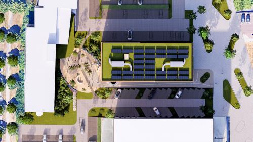 Aerial view of the office complex at Moutlaan 1-23, Enschede. The exterior showcases structured parking areas and surrounding greenery, perfect for a professional environment.