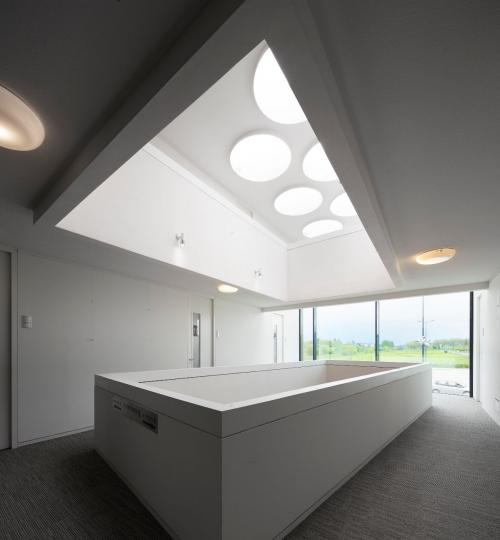 Modern office space with a unique ceiling design at Transportlaan 1-151, Geleen, available for office space rental.