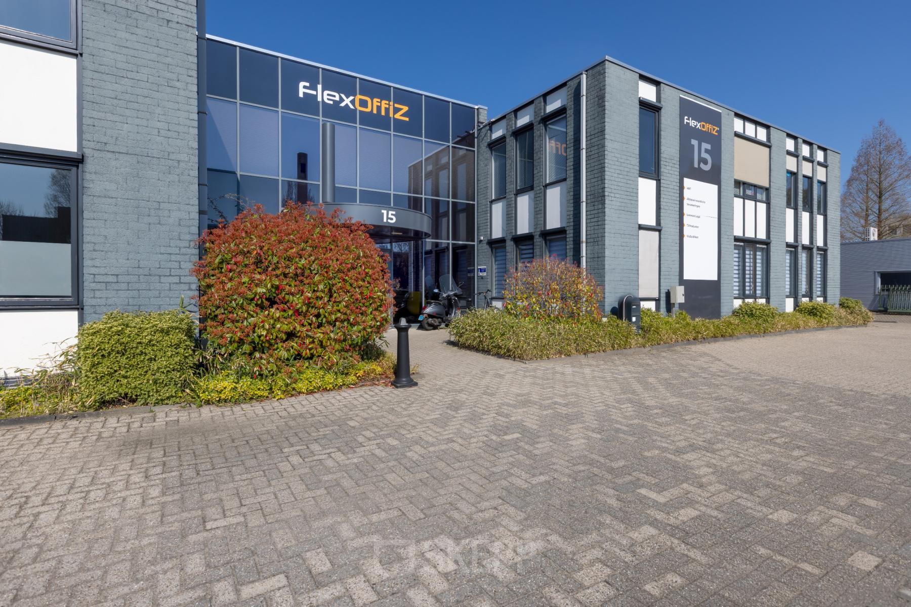 Exterior view of an office building at Techniekweg 15, Gorinchem, ideal for office space rental.