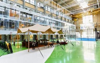 Spacious interior at Helperpark 270-298 in Groningen featuring a unique tented meeting area. Ideal for office space rental.