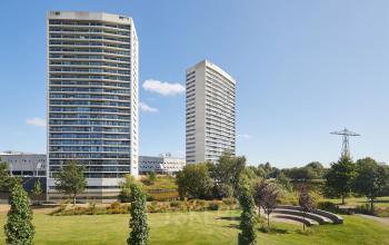 Exterior view of office buildings at Helperpark 270-298 in Groningen, ideal for office space rental with surrounding greenery.