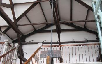 View of a staircase and wooden beam structure inside an office space located at Wilhelminastraat 43A, Haarlem Centrum, Haarlem, available for office space rental.