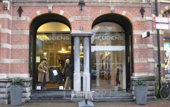 Exterior view of an office building located at Zijlstraat 76, Haarlem Centrum, Haarlem, with arched windows and glass entrance doors.