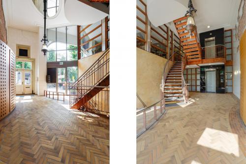Entrance of office at Grote Houtstraat 176-180 Haarlem Centrum, featuring large windows, wooden floors, and a staircase. Spacious area suitable for office space rental.
