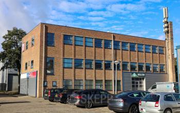 Exterior view of an office building located at Nijverheidsweg 50 in Haarlem Oost, showcasing a potential office space rental.