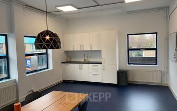 Bright office space with modern furnishings and a kitchenette, perfect for office space rental at Nijverheidsweg 50, Haarlem Oost.
