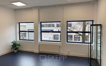 Bright office space rental at Nijverheidsweg 50, Haarlem Oost, featuring large windows and a sleek interior design.