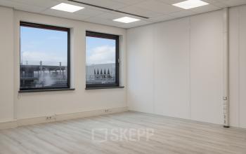 Spacious, unfurnished office space with large windows at Mollerusweg 84, ideal for rent office space in Haarlem Waarderpolder.