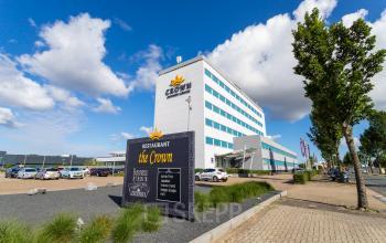 Exterior of the office building at A. Hofmanweg 5A, Haarlem Waarderpolder, Haarlem, featuring modern design and nearby parking area. Suitable for those looking for office space rental.