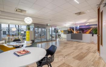 Spacious office to rent at A. Hofmanweg 5A, Haarlem Waarderpolder, featuring a well-lit interior with modern furnishings and open workspaces.