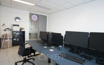 Spacious office space available for rent in Haarlem Waarderpolder, featuring multiple desks with computers and ergonomic chairs. Perfect for those seeking office space rental.