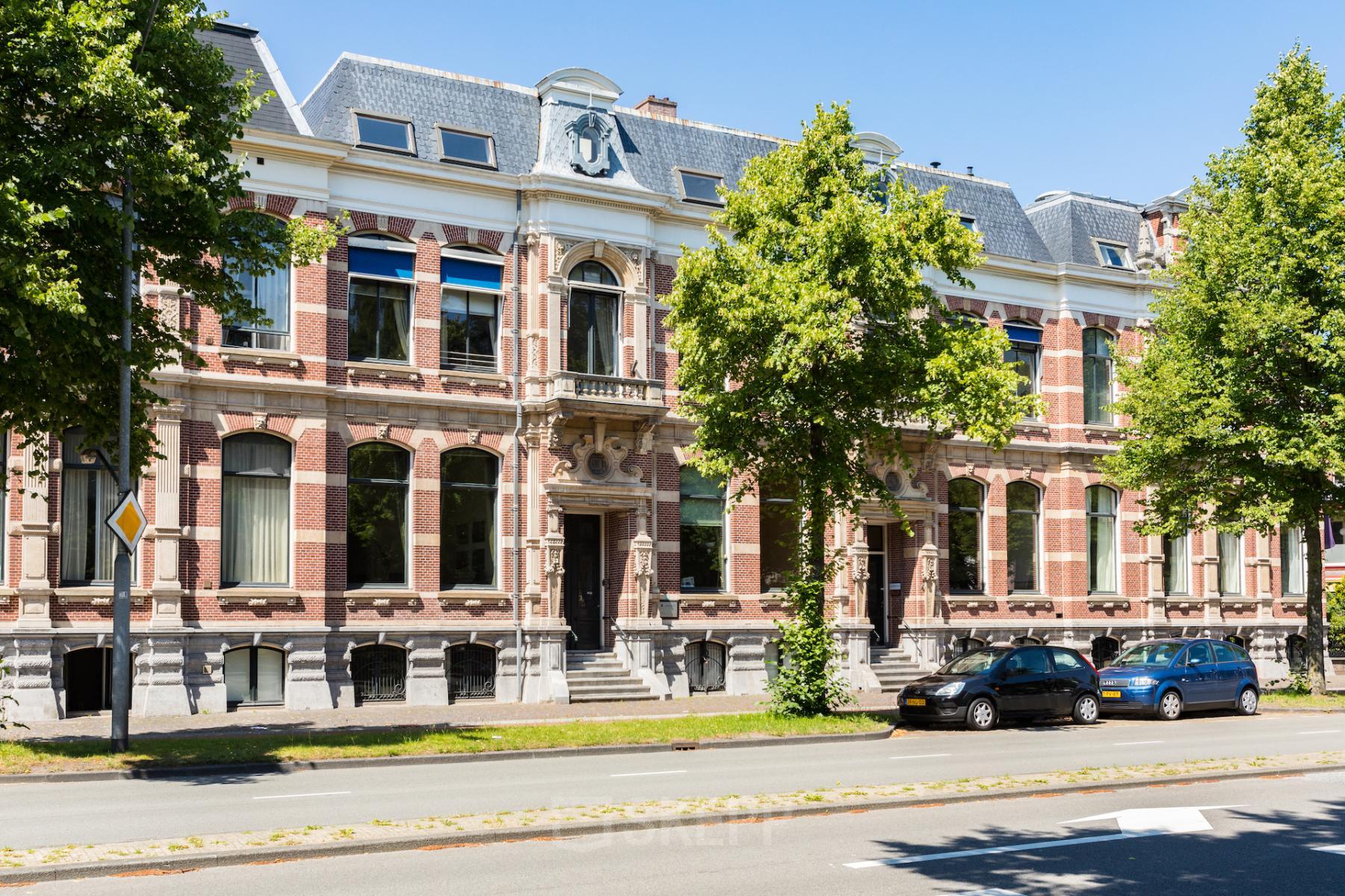 Exterior view of the office building at Dreef 36, in Haarlem Zuid, Haarlem, featuring classic architecture and large windows.
