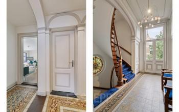 Grand hallway with intricate tile flooring and a curved wooden staircase, leading to furnished office space at Florapark 7, Haarlem Zuid, Haarlem.