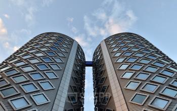 Architectural detail of the modern Suikersilo Oost-West 1-41 building, available for office space rental in Halfweg.