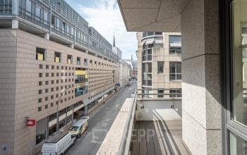 Street view of office buildings in Hamburg Old Town at Raboisen 38. Ideal location for those seeking office space rental with convenient access.