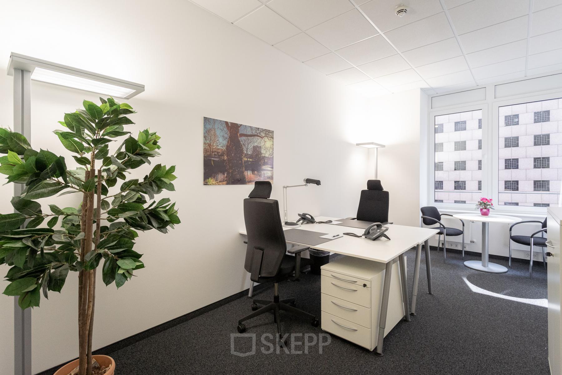 Furnished office space at Raboisen 38, Hamburg Old Town, featuring desks, chairs and office equipment, ideal for office space rental.