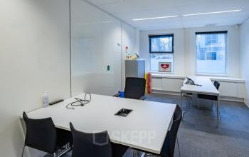 Interior office space at Olympia 4, Hilversum, featuring modern desks, chairs, and natural light, available for office space rental.
