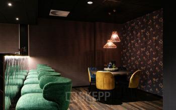 Stylish workspace at Steijnlaan 16, Hilversum, featuring vibrant seating and a cozy atmosphere, perfect for office space rental.