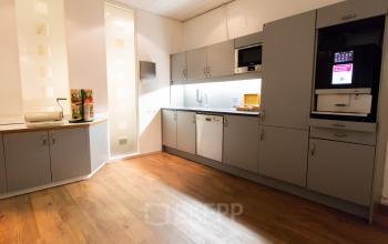 Office space rental at Siriusdreef 17, Hoofddorp, showing a neat, well-equipped kitchen area with modern amenities.