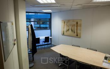 office space chairs tables paintings
