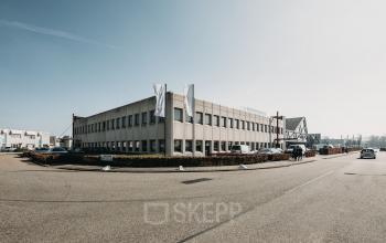 Exterior view of a two-story office building at Meidoornkade 22, Houten, ideal for office space rental.