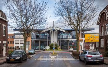 Exterior view of the office building located at Eurodepark 1, Kerkrade, with its modern architecture visible from the street.