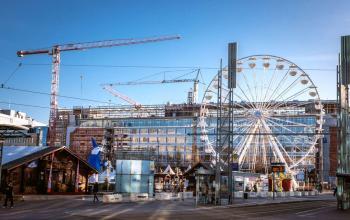 Immobilie am Augustusplatz in Leipzig mit Riesenrad auf dem Vorplatz