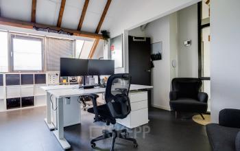 Furnished office space at Hamersveldseweg 120, Leusden, featuring desks with computers and comfortable chairs, ideal for rent office space activities.