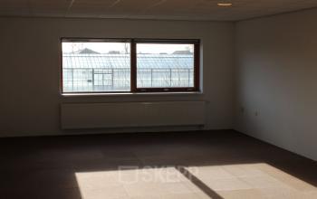 Bright office space rental with a large window at Zijakkertje 2, in Limmen.