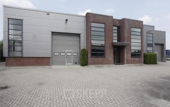 Modern office space rental at Van Rietlaan 11 in Linschoten with exterior brick and large windows.