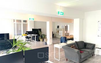 Bright office space at Wilhelminasingel 44-46, Maastricht, featuring modern desks and comfortable seating areas, ideal for office space rental.
