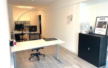 Furnished office space with desks and chairs available for rent at Wilhelminasingel 44-46, Maastricht.