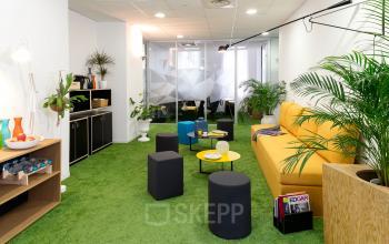 Bright office space rental at Rue de la République 113 in Marseille 2, with modern furniture and vibrant decor.