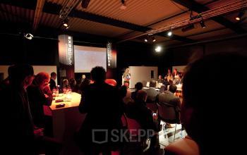 Modern conference room with a presentation in progress at Koopvaardijweg 2 office space rental, Oosterhout Nb.