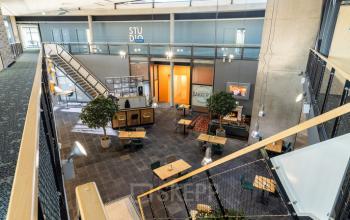 Spacious and modern office space in Oosterwolde with multiple workstations and a contemporary design, ideal for office space rental.