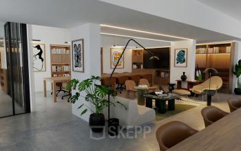 Espace de bureau à louer à Rue de la Victoire 10, Paris 9ème, avec meubles contemporains, plantes vertes et décorations murales modernes. Le bureau est bien éclairé et équipé de bibliothèques en bois.