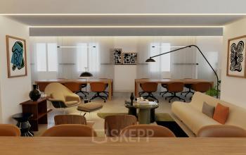 Espace de bureau à louer à Rue de la Victoire 10, Paris 9ème, avec un intérieur moderne comprenant plusieurs stations de travail et des œuvres d'art accrochées aux murs.