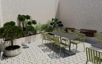 Espace de bureau à louer à Rue de la Victoire 10, Paris 9ème, avec terrasse extérieure aménagée de tables et chaises, entourée de plantes.