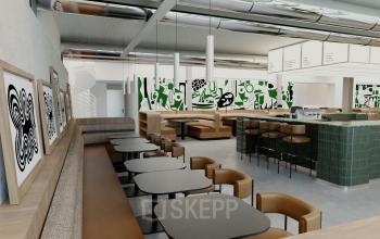 Espace de bureau moderne à louer à Rue de la Victoire 10, Paris 9ème, avec café-bar intégré et sièges confortables.