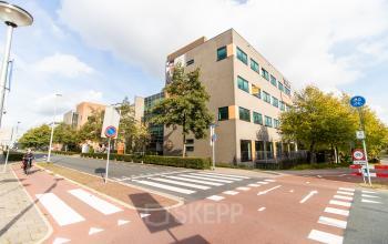 Exterior view of an office building at Laan van Vredenoord 33, Rijswijk, ideal for office space rental.