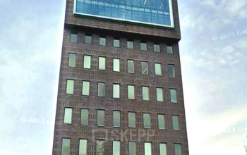 Exterior view of a modern office building for rent at Laan van Zuid Hoorn 70, Rijswijk, featuring a sleek and contemporary design with multiple floors and large windows.