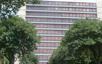 Exterior view of the office building at J.C. van Markenlaan 3 in Rijswijk, ideal for office space rental with adjacent parking.