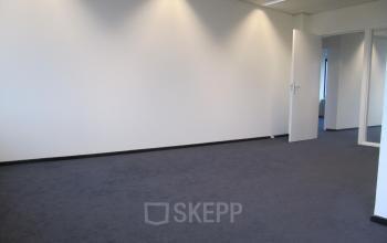 Spacious office to rent at JC van Markenlaan 3, Rijswijk, with neutral walls and carpet, ideal for office space rental.
