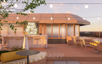 Outdoor office space rental at Marten Meesweg 101, Rotterdam Alexander, featuring wooden flooring, seating areas, and string lights under a sunset sky.