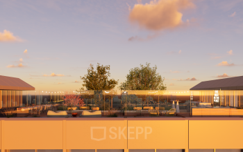 Rooftop area at Marten Meesweg 101, Rotterdam Alexander, featuring outdoor seating and greenery for office space rental.