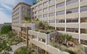 Exterior view of a modern office building at Marten Meesweg 101, Rotterdam Alexander, showcasing a vibrant space perfect for office space rental.